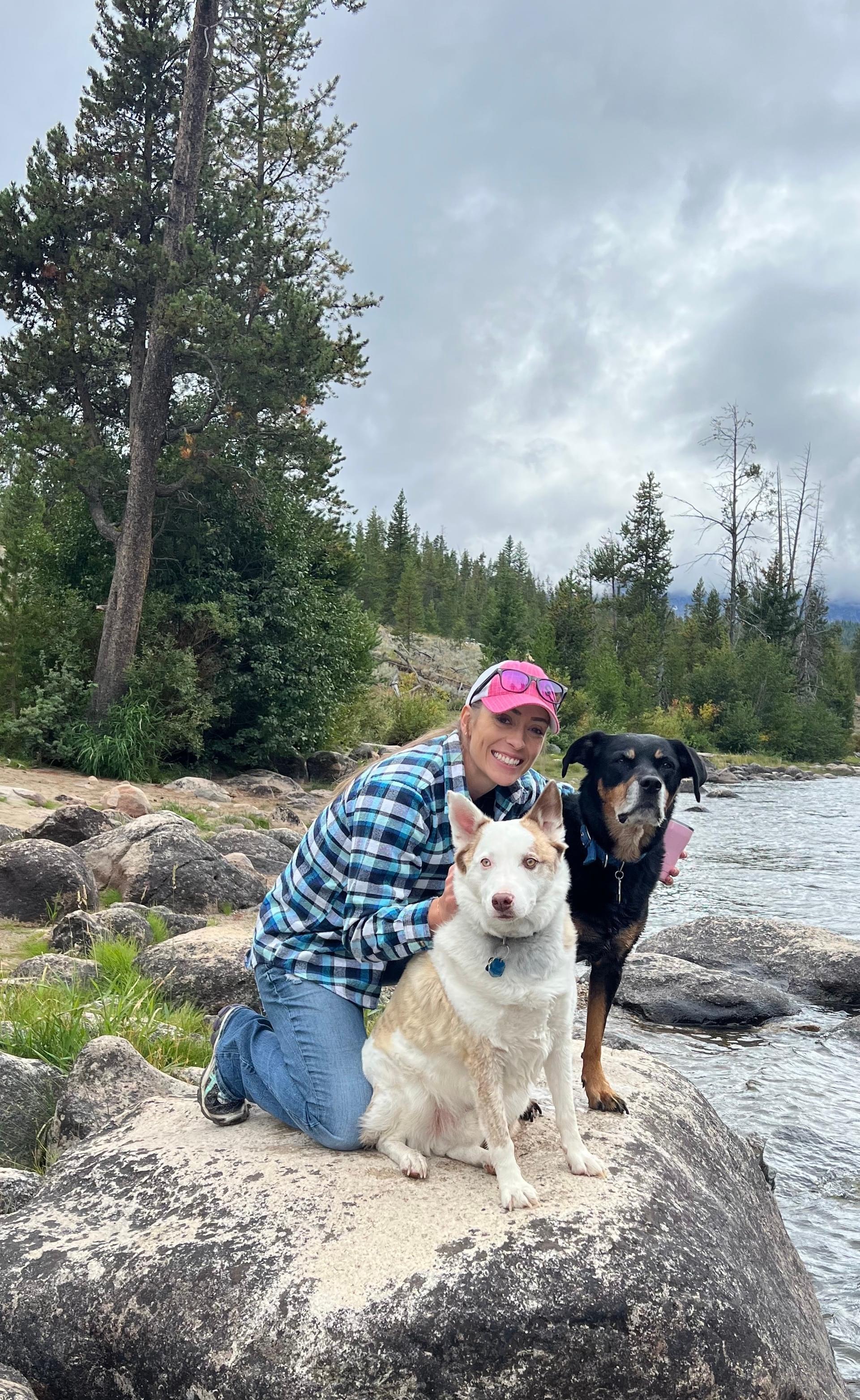 Coach Allie in the mountains with her dogs